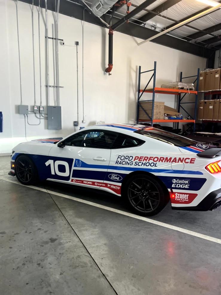 Ford Performance Racing School Mustang number 10 in the shop