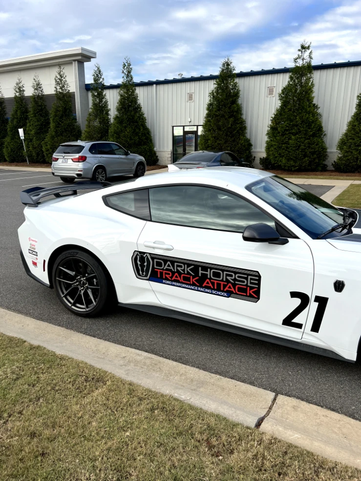 White Mustang Dark Horse with Track Attack door graphics and number 21