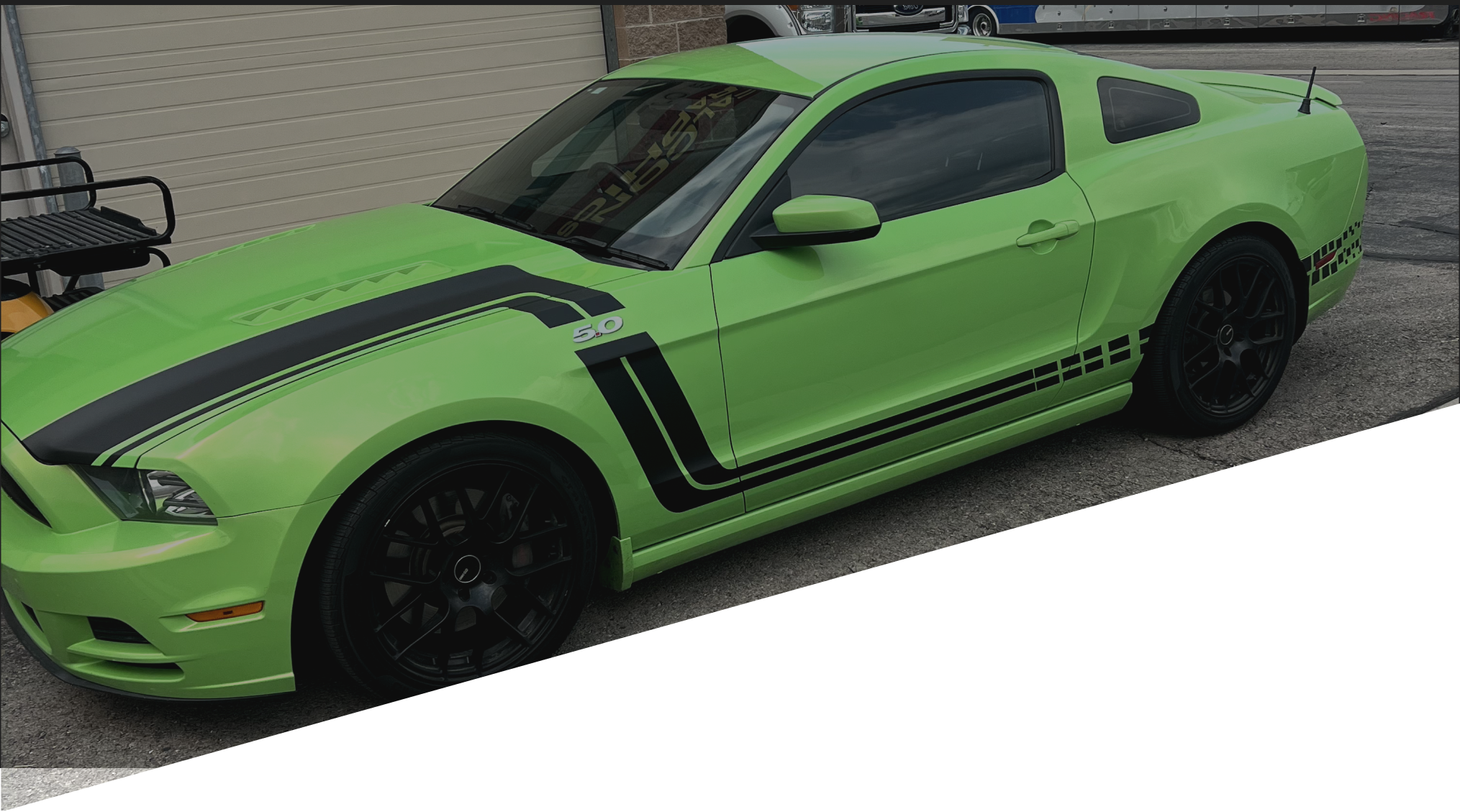 Green Mustang with custom wrap